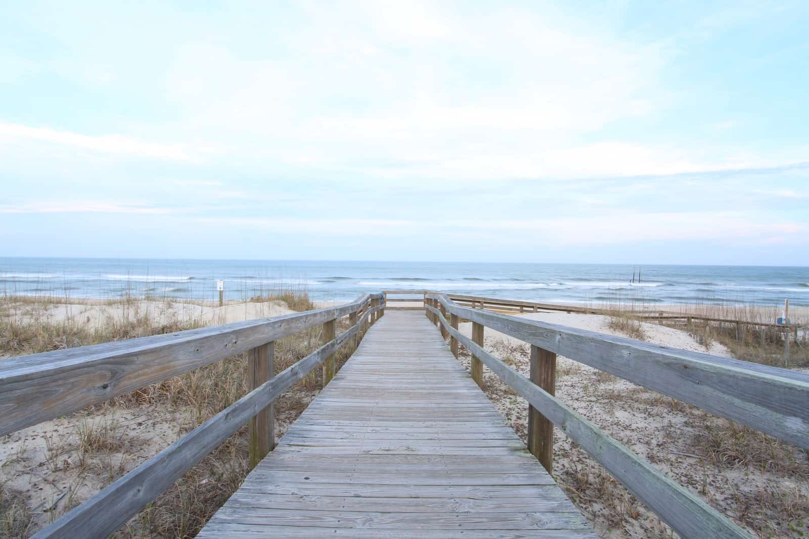 Photo by Todd DeSantis brown wooden dock during daytime